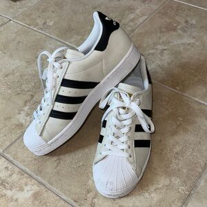 Adidas Superstars Cream and Black Striped Sneakers